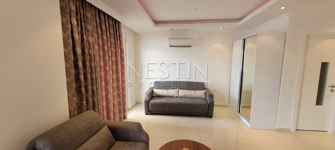 Просторная квартира студия 0+1 в районе Авсаллар фото 16