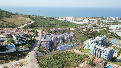 Квартира 1+1 в новом комплексе в районе Каргыджак, в 650 м от Средиземного моря фото 30