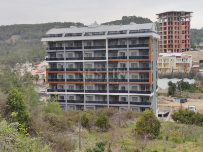 Светлая квартира 1+1 в новом комплекса в районе Авсаллар фото 1