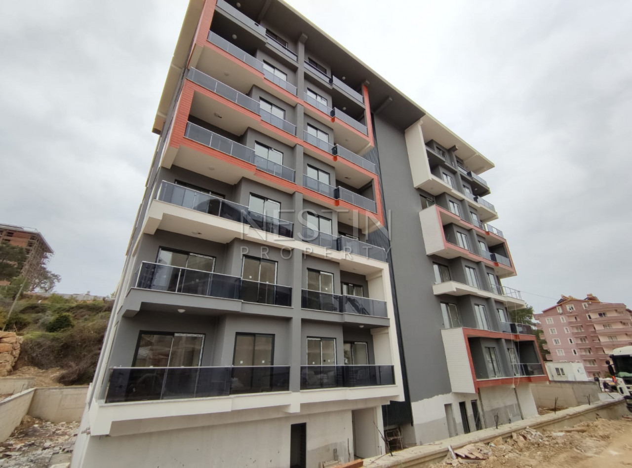 Светлая квартира 1+1 в новом комплекса в районе Авсаллар фото 29