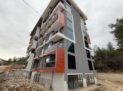 Светлая квартира 1+1 в новом комплекса в районе Авсаллар фото 30