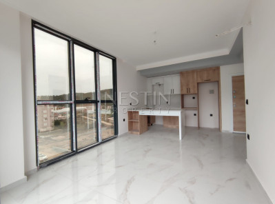 Светлая квартира 1+1 в новом комплекса в районе Авсаллар фото 35