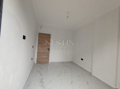 Светлая квартира 1+1 в новом комплекса в районе Авсаллар фото 41