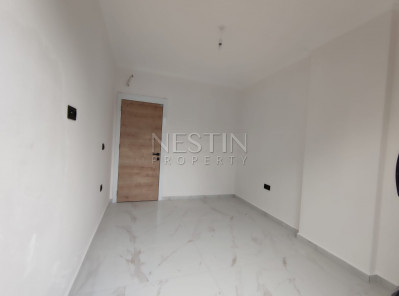 Светлая квартира 1+1 в новом комплекса в районе Авсаллар фото 42