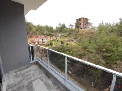 Светлая квартира 1+1 в новом комплекса в районе Авсаллар фото 44