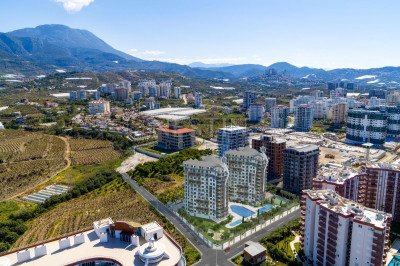 Квартира 1+1 в районе Махмутлар в комплексе на этапе строительства фото 4