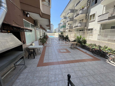 Квартира 1+1 в районе Оба со стильным интерьерным дизайном фото 14