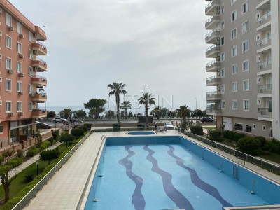 Уютная квартира 2+1 в районе Махмутлар, первая линия фото 3