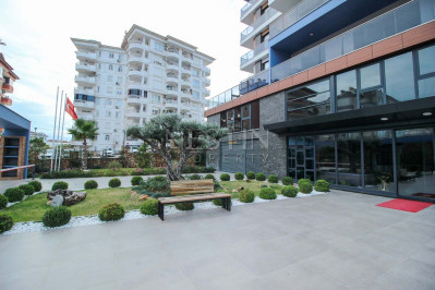 Просторный дуплекс с видом на море 4+1 в районе Тосмур фото 1