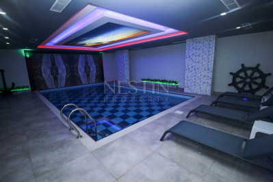 Просторный дуплекс с видом на море 4+1 в районе Тосмур фото 13