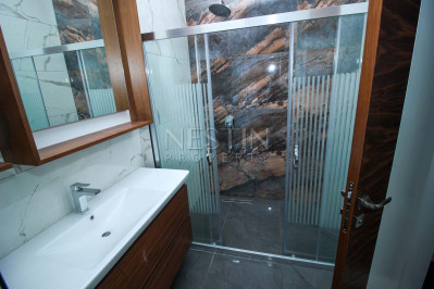 Просторный дуплекс с видом на море 4+1 в районе Тосмур фото 28