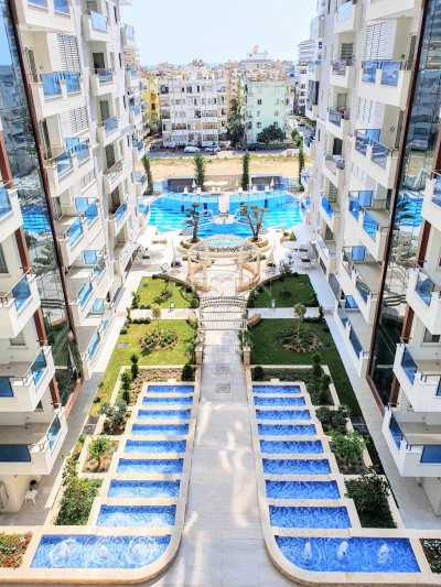 Квартира 1+1 в роскошном комплексе в центре Махмутлара фото 2