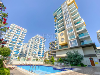 Квартира 1+1 с дизайнерским ремонтом в районе Махмутлар, в 300 м от Средиземного моря фото 1