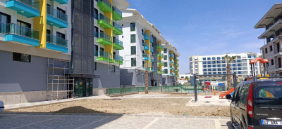 Квартиры 1+1 в комплексе района Каргыджак в 100 м от моря фото 1