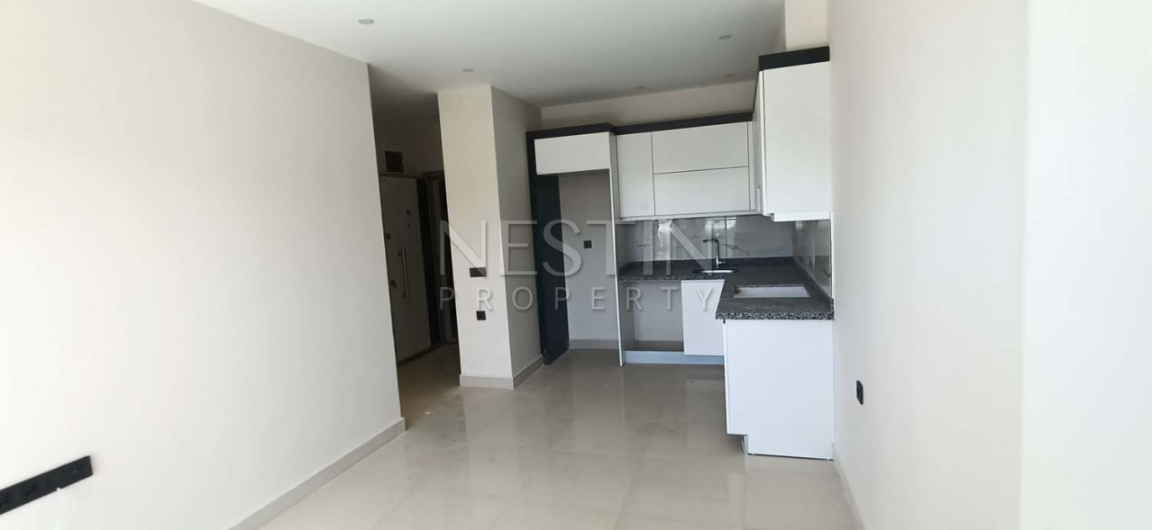 Квартиры 1+1 в комплексе района Каргыджак в 100 м от моря фото 9