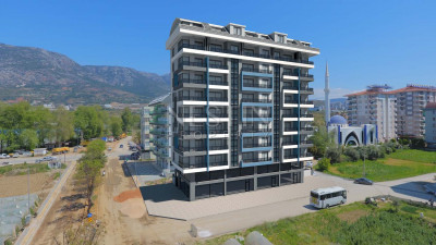 Квартира 1+1 в новом комплексе в районе Махмутлар, в 400 м от Средиземного моря фото 1