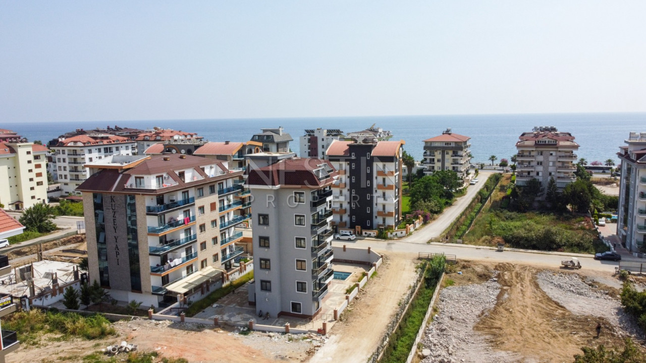 Квартира 1+1 в новом доме района Кестель в 100 м от моря фото 1