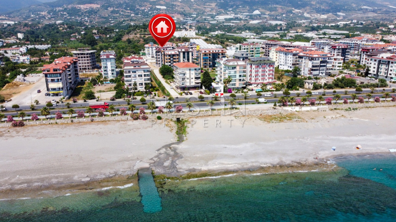 Квартира 1+1 в новом доме района Кестель в 100 м от моря фото 2