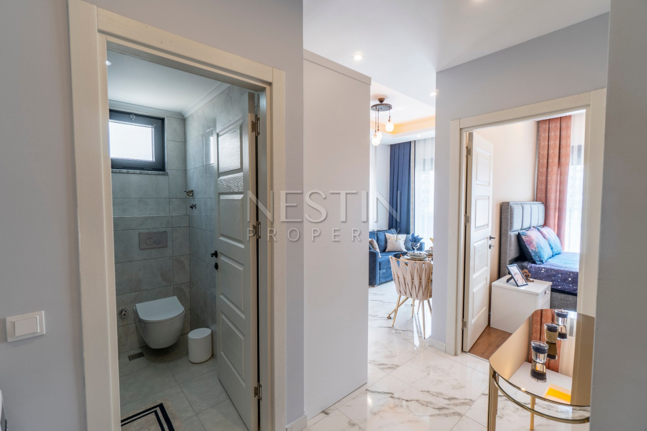 Квартира 1+1 в новом доме района Кестель в 100 м от моря фото 6