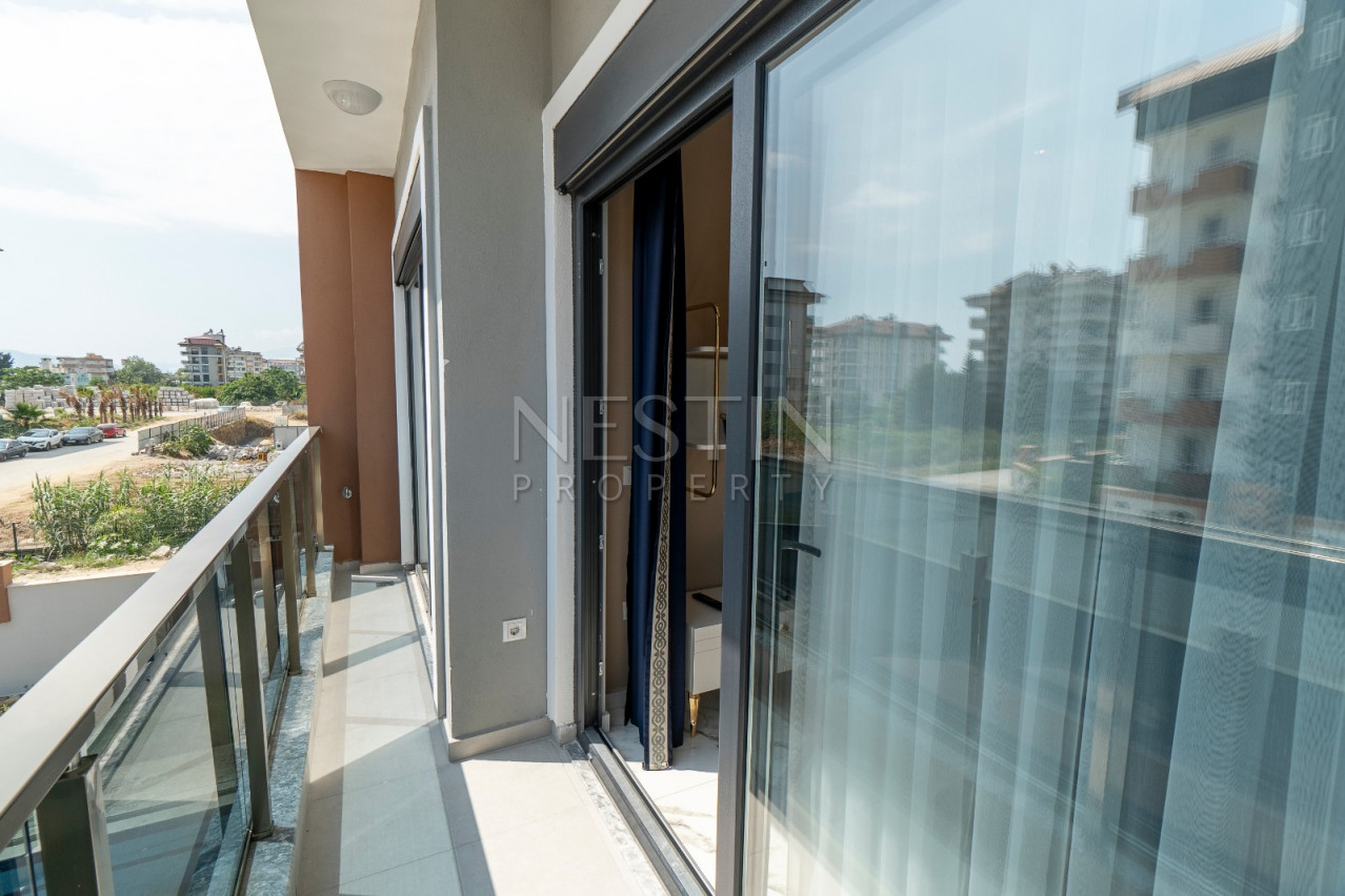 Квартира 1+1 в новом доме района Кестель в 100 м от моря фото 13