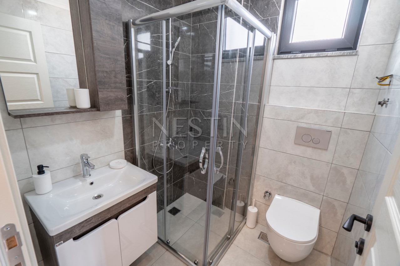 Квартира 1+1 в новом доме района Кестель в 100 м от моря фото 14