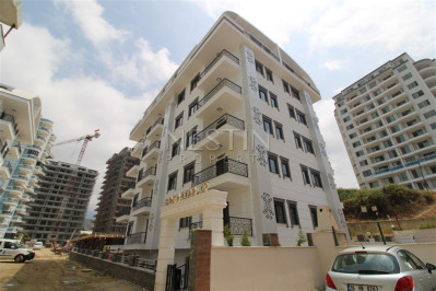 Квартира 1+1 в новом комплексе в районе Махмутлар, в 500 м от Средиземного моря фото 1