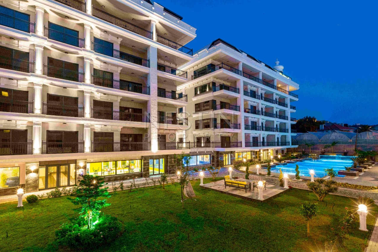 Великолепный жилой комплекс в районе Каргыджак в 50 метрах от пляжа фото 9