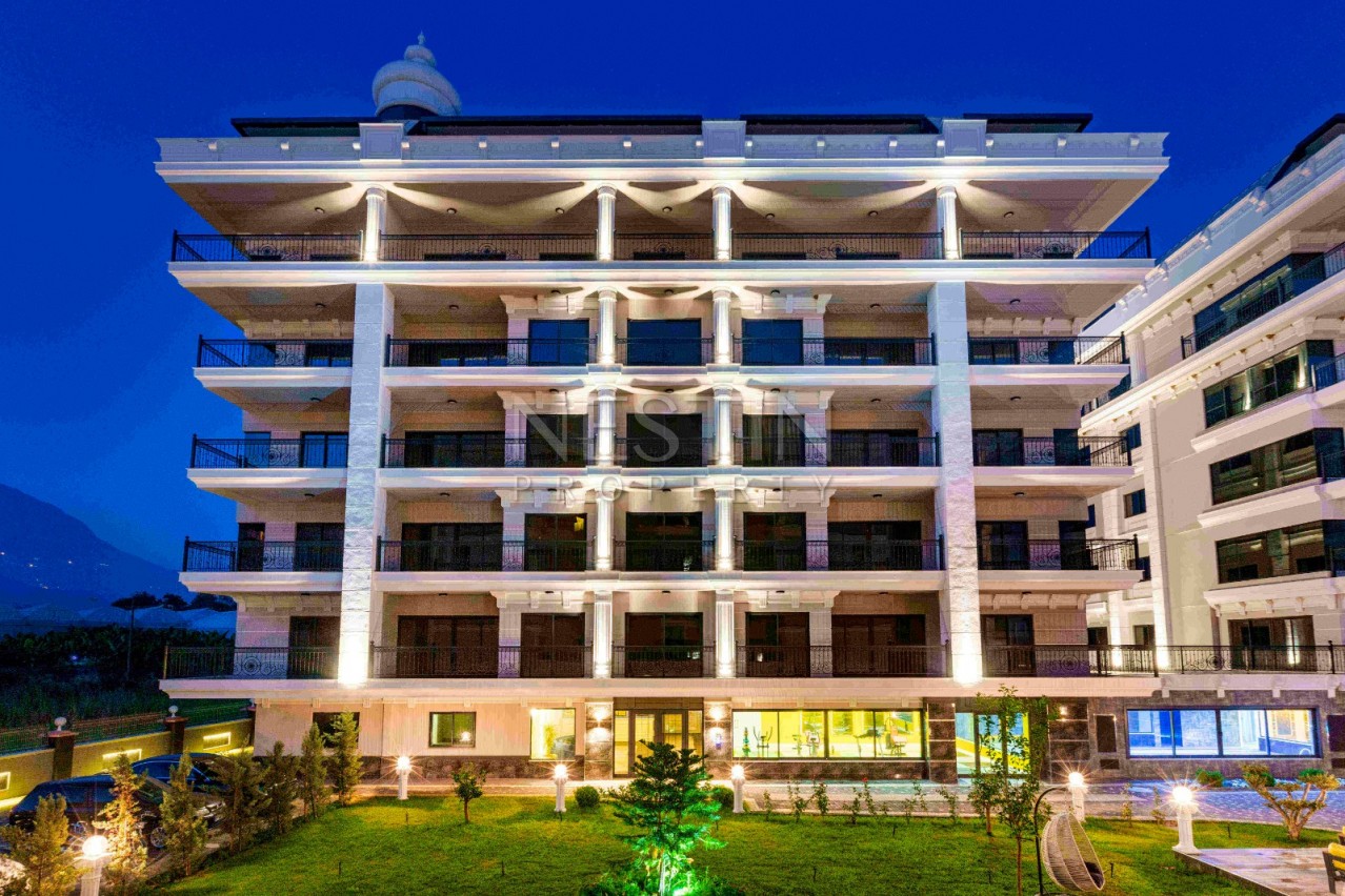 Великолепный жилой комплекс в районе Каргыджак в 50 метрах от пляжа фото 10